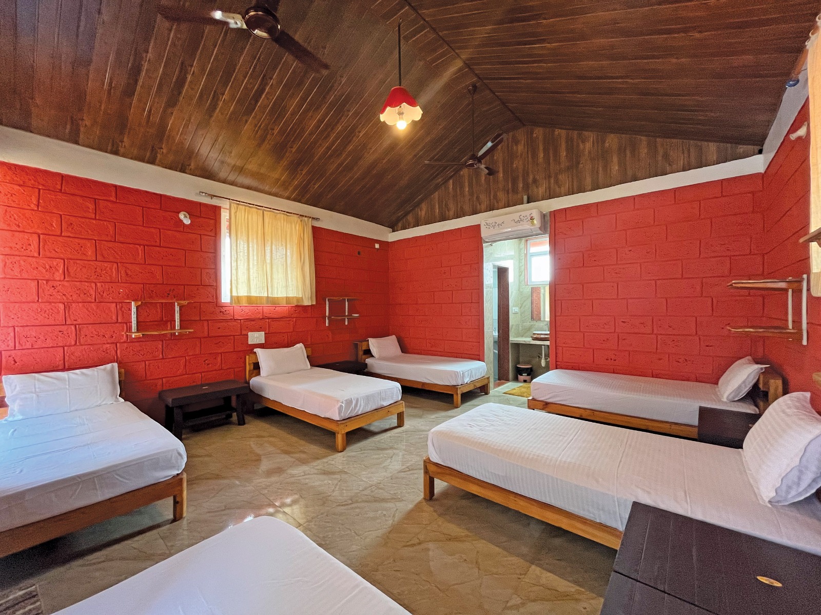 Six-bed dormitory interior at Mitraay Resort