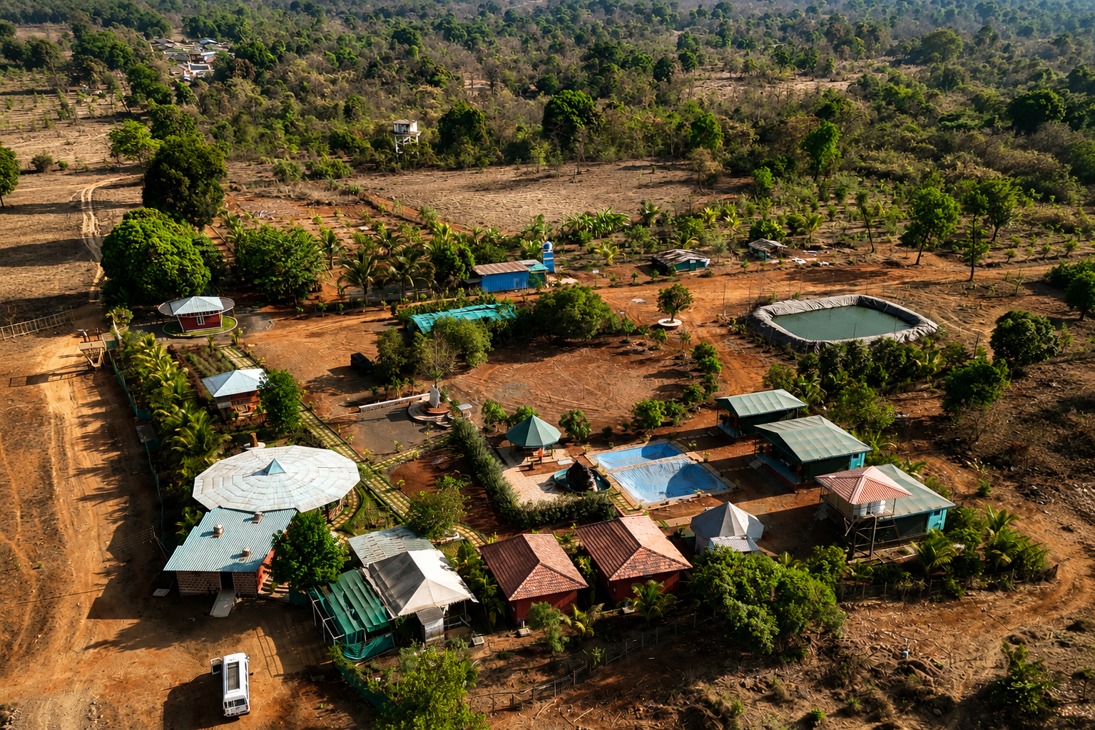 Aerial overview of Mitraay Agro Resort property and grounds